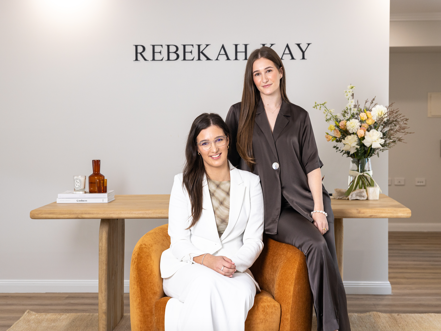 A image of our two sister founders in their jewellery boutique